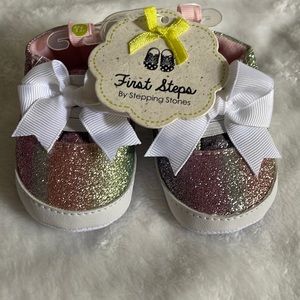 Never worn rainbow shoes. Size: 1 (0-3months).